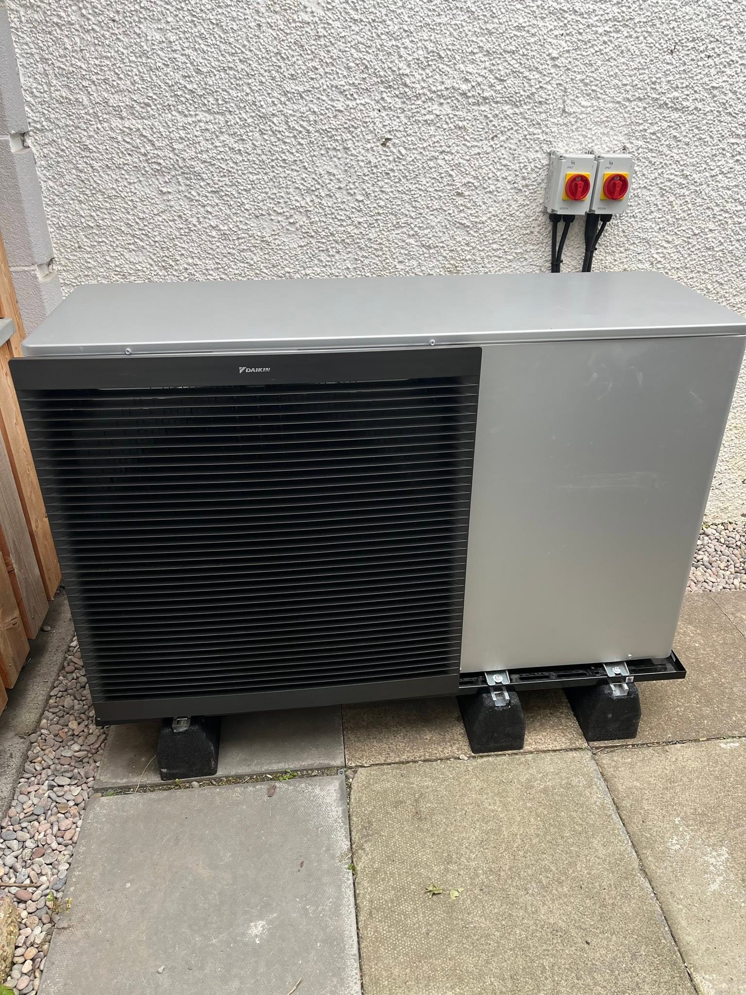 Close view of a FLO heat-pump installation with supports and local isolators