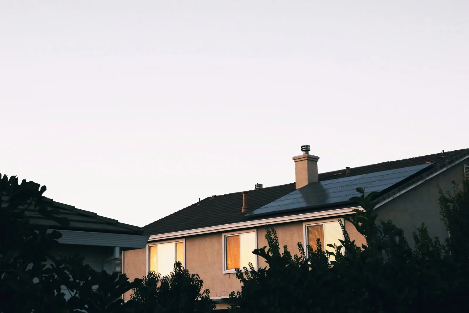 FLO solar panels installed on a residential roof at dusk