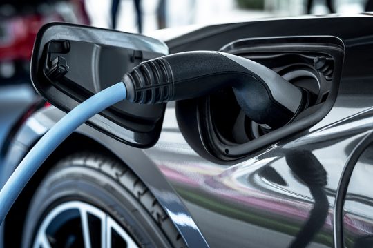 electric-car-at-charging-station-2021-08-30-13-44-02-utc